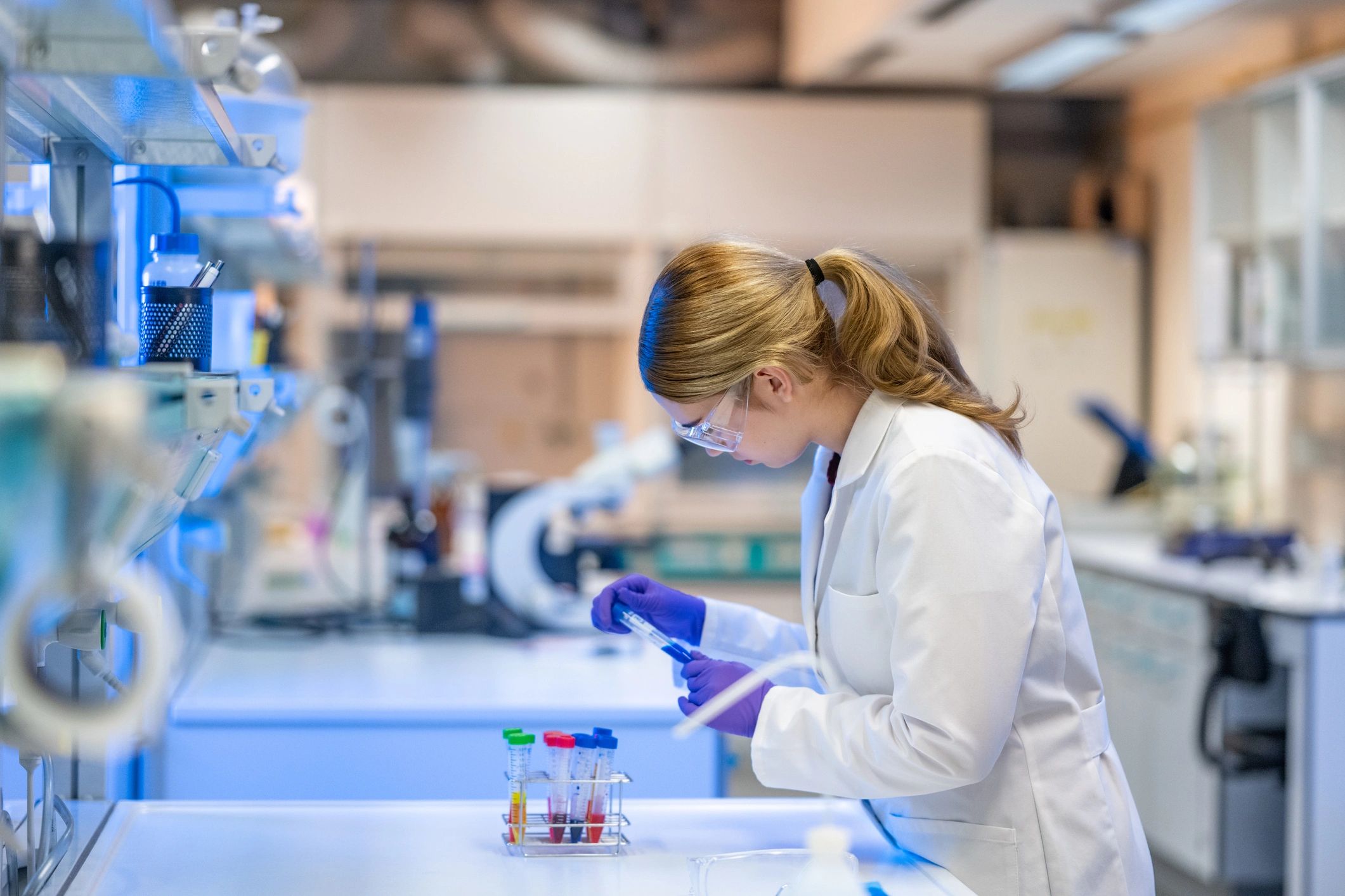 Scientist analyzing samples in an advanced laboratory
